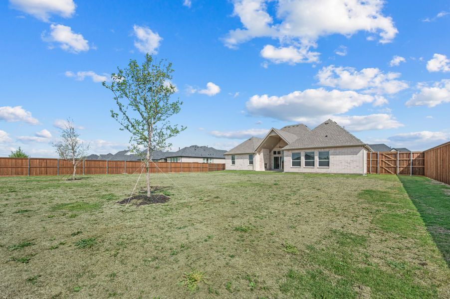 Exterior details and patio area of a home in NorthGlen, Haslet (Image 31).