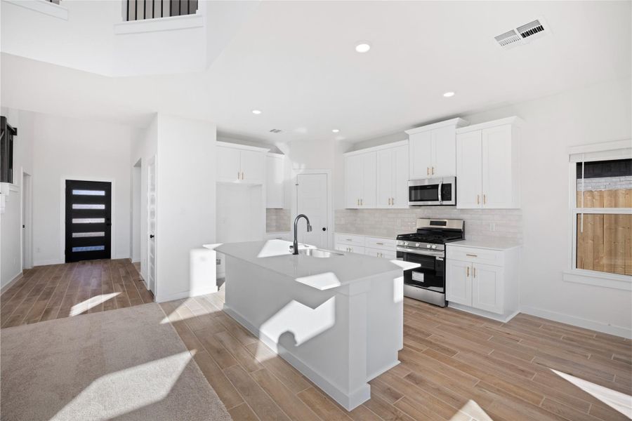 Furnished interior view inside a new home in , Manvel (Image 6).