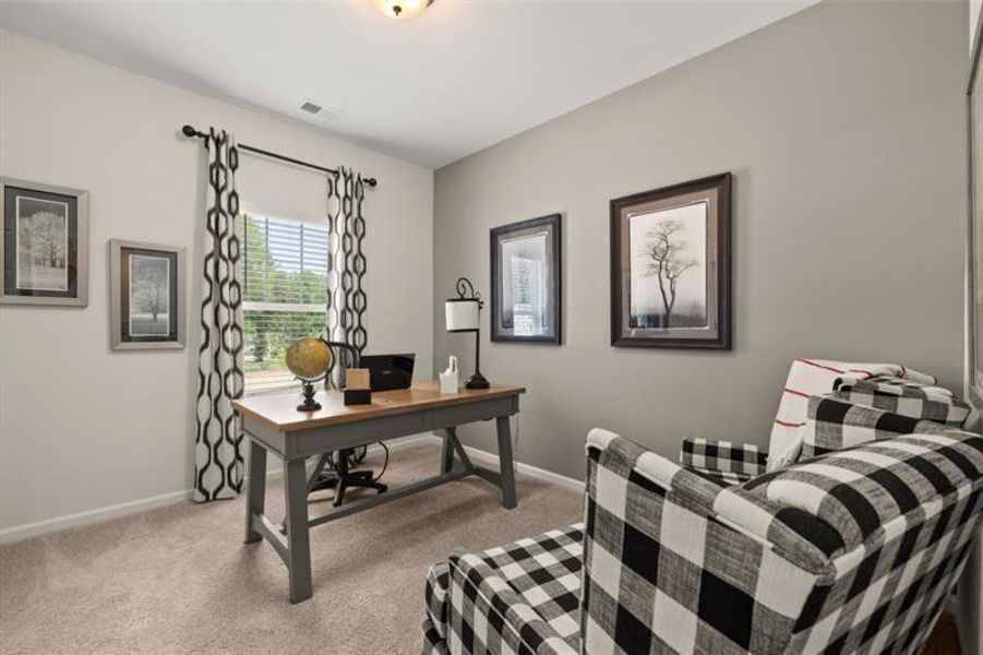 Furnished interior view inside a new home in Jameson Towns, Villa Rica (Image 6).