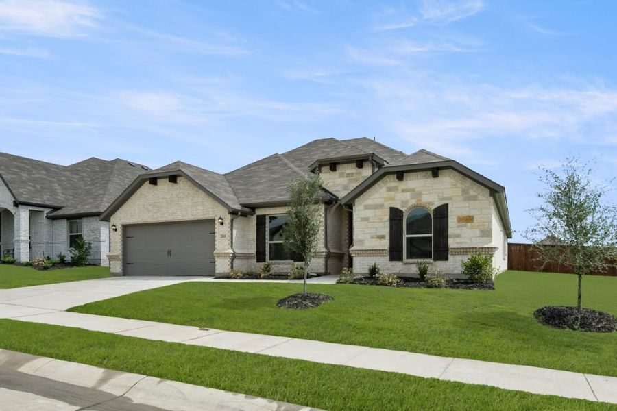 Representative exterior photo of a completed home built from the Walden by Impression Homes in Timberbrook, Justin, TX (Image 2).