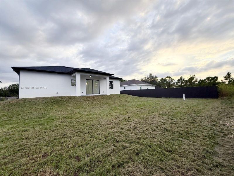 Exterior details and patio area of a home in , Lehigh Acres (Image 3). Exterior details and patio area of a home in , Lehigh Acres (Image 3).