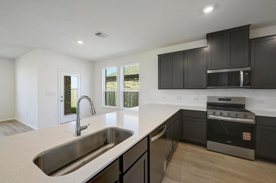 Furnished interior view inside a new home in Centerpoint Meadows, Lockhart (Image 9). Furnished interior view inside a new home in Centerpoint Meadows, Lockhart (Image 9).