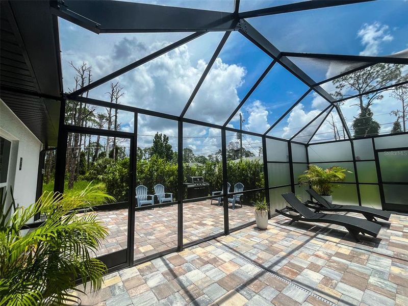 Exterior details and patio area of a home in , North Port (Image 24).