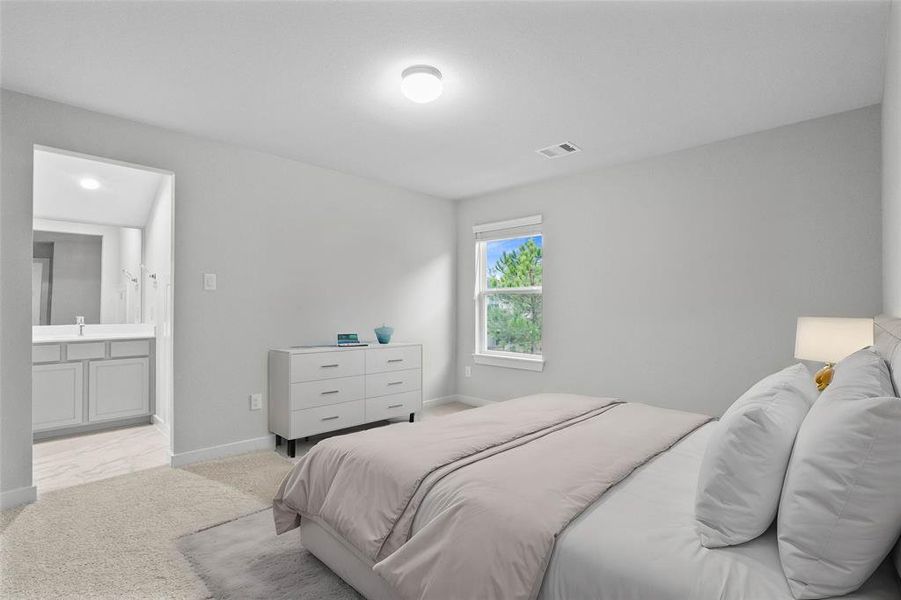 Secondary bedroom features plush carpet, custom paint, high ceilings, large window with privacy blinds and access to its own private vanity shared club bath.