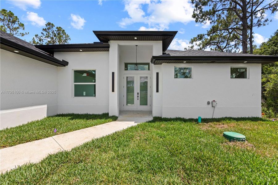 Exterior details and patio area of a home in , Lehigh Acres (Image 2).