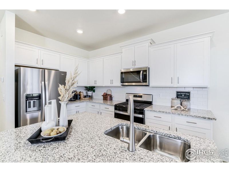 Furnished interior view inside a new home in Revere at Johnstown, Johnstown (Image 24).