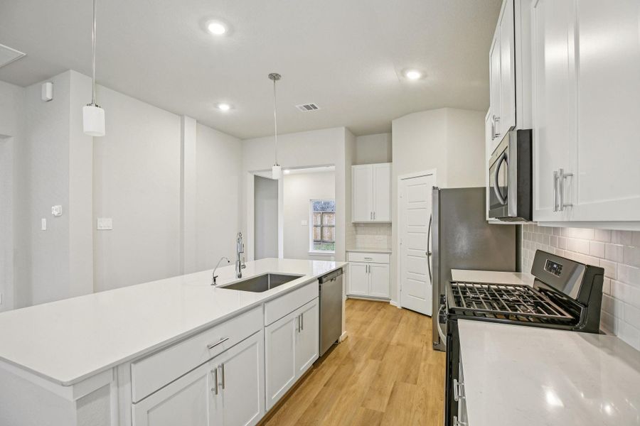 Photo is not of the actual home, but is an inspirational photo of builder’s model home and may depict options, furnishings, and/or decorator features that are not included