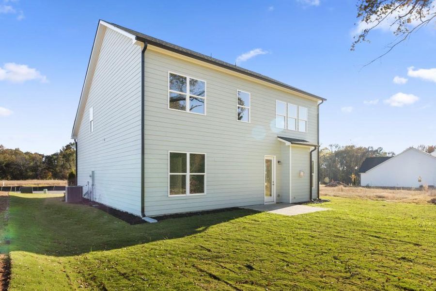 Exterior details and patio area of a home in Red Bird Manor, Jefferson (Image 4).