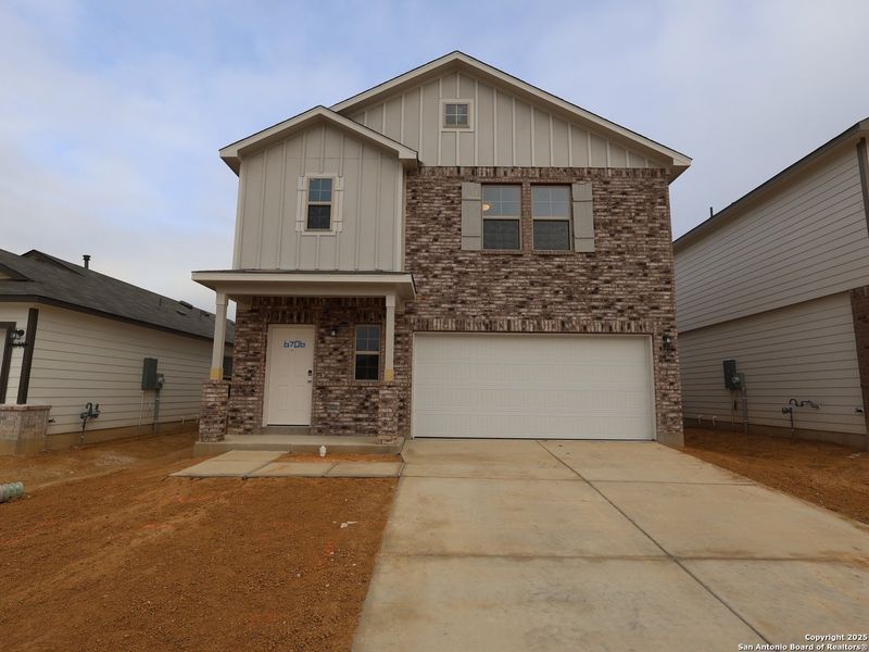 Front exterior of a new home in Winding Brook, San Antonio, TX, highlighting curb appeal (Image 1). Front exterior of a new home in Winding Brook, San Antonio, TX, highlighting curb appeal (Image 1).