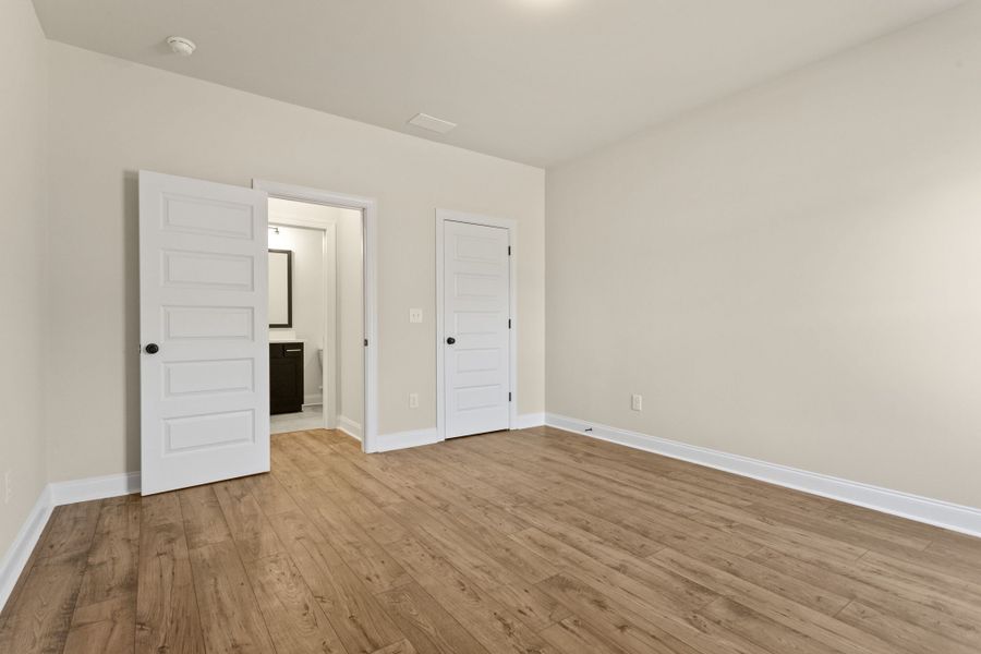 Spacious, unfurnished interior of a new home in Cherokee Knoll, Williamston (Image 20).
