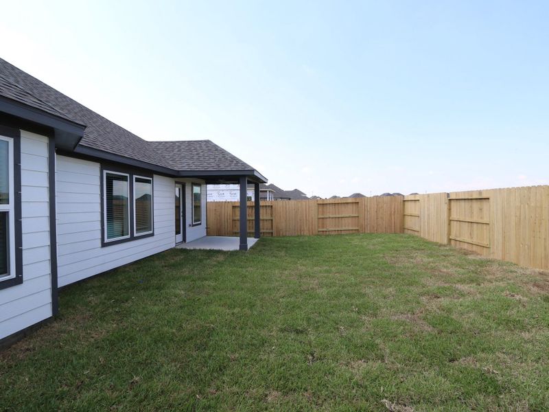Exterior details and patio area of a home in Lago Mar, Santa Fe (Image 14). Exterior details and patio area of a home in Lago Mar, Santa Fe (Image 14).