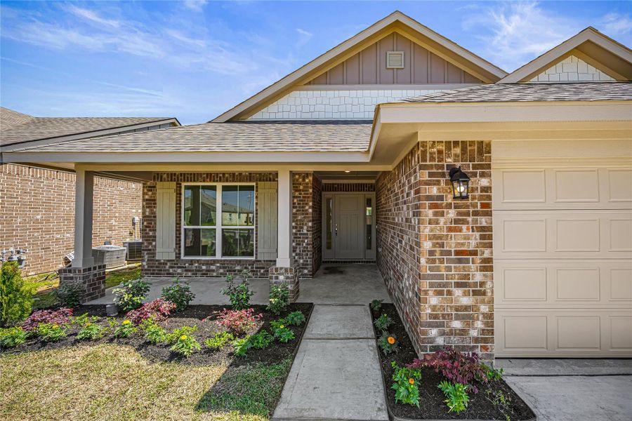 Front exterior of a new home in Grand Oaks Reserve, Cleveland, TX, highlighting curb appeal (Image 14). Front exterior of a new home in Grand Oaks Reserve, Cleveland, TX, highlighting curb appeal (Image 14).