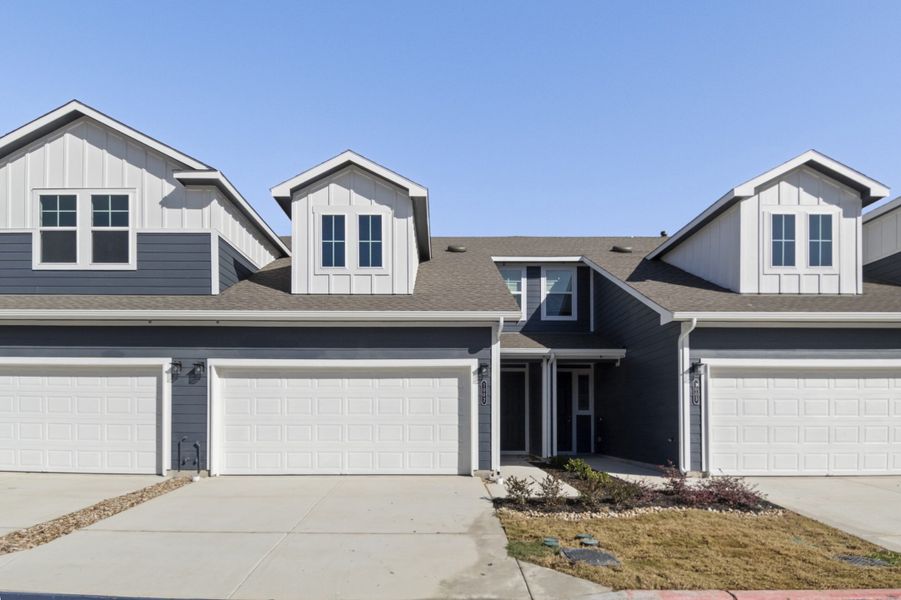 Front exterior of a new home in Center 45, Round Rock, TX, highlighting curb appeal (Image 2). Front exterior of a new home in Center 45, Round Rock, TX, highlighting curb appeal (Image 2).