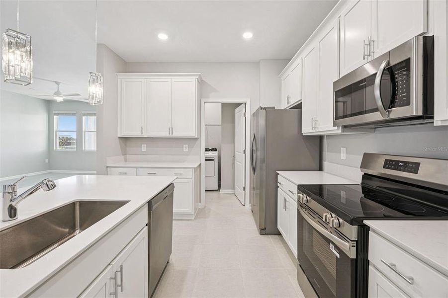 Furnished interior view inside a new home in Wellness Ridge, Clermont (Image 7).