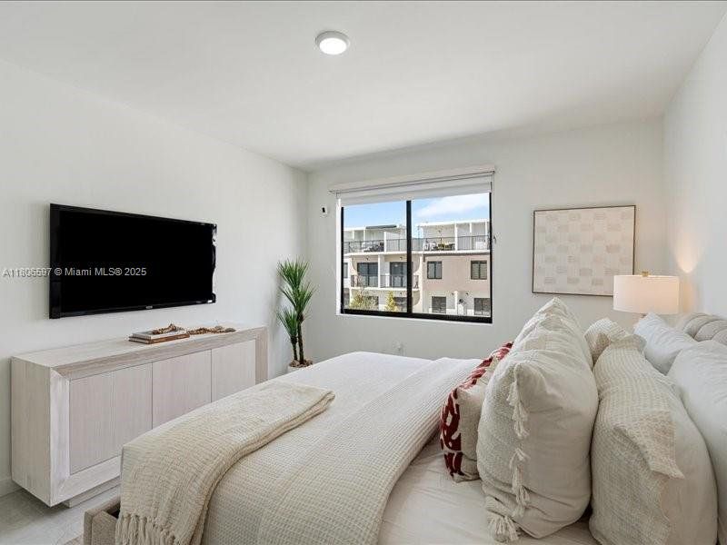 Furnished interior view inside a new home in On Grandville, Homestead (Image 23).