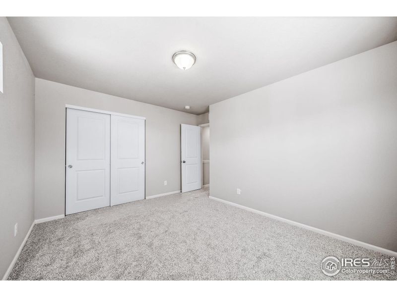 Spacious, unfurnished interior of a new home in Thompson River Ranch, Johnstown (Image 17).