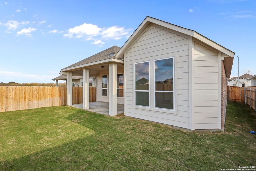 Exterior details and patio area of a home in Sunflower Ridge, New Braunfels (Image 3).