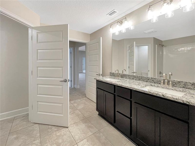 Furnished interior view inside a new home in Harmony Central, St. Cloud (Image 5).