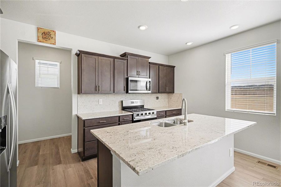 Furnished interior view inside a new home in Murphy Creek, Aurora (Image 13).
