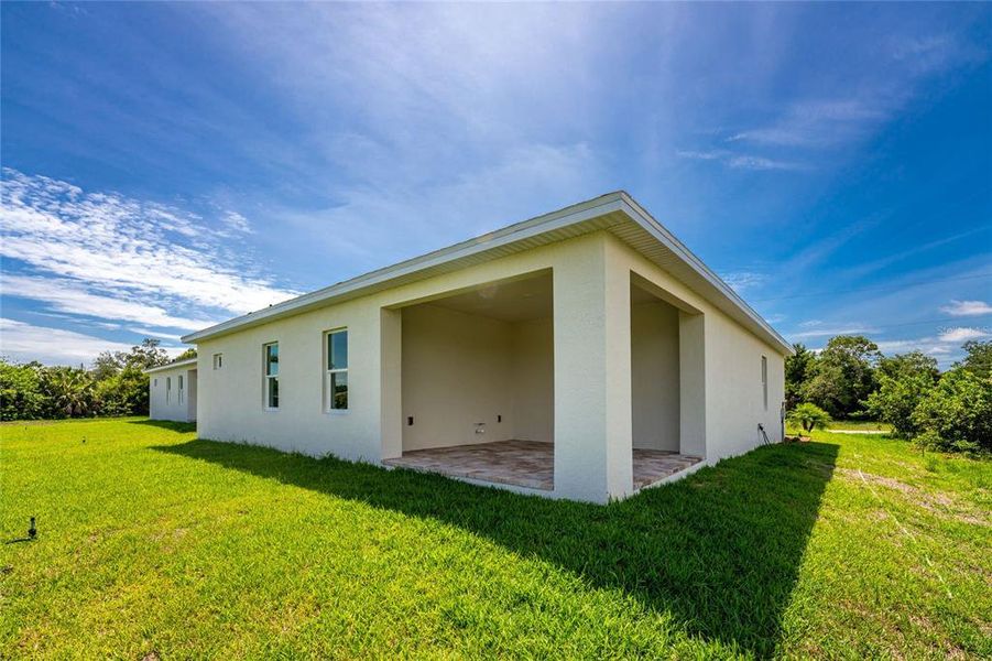 Exterior details and patio area of a home in , Rotonda West (Image 32).
