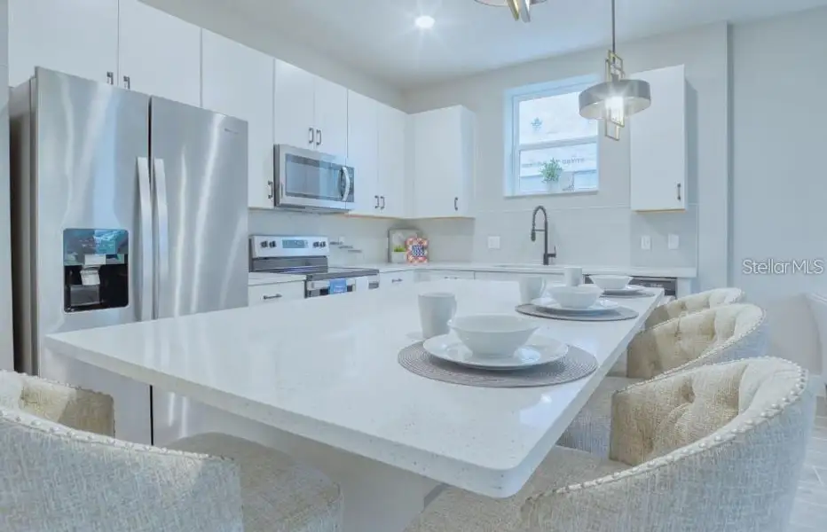 Furnished interior view inside a new home in , Kissimmee (Image 6).