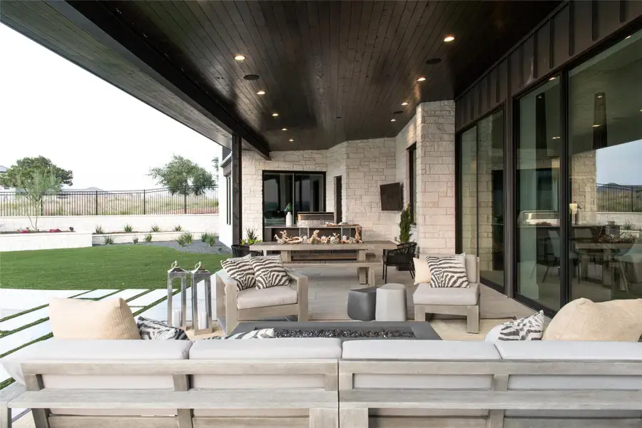 View of patio / terrace with an outdoor living space with a fire pit