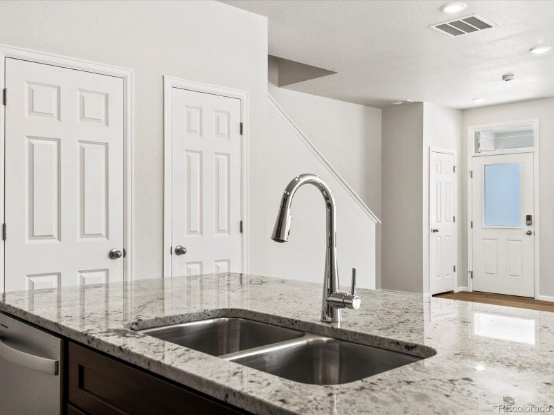 Furnished interior view inside a new home in Skyview at High Point, Aurora (Image 6).