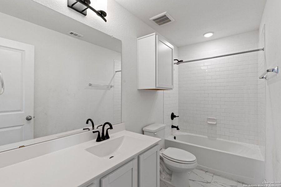Furnished interior view inside a new home in Hickory Ridge, Elmendorf (Image 14).