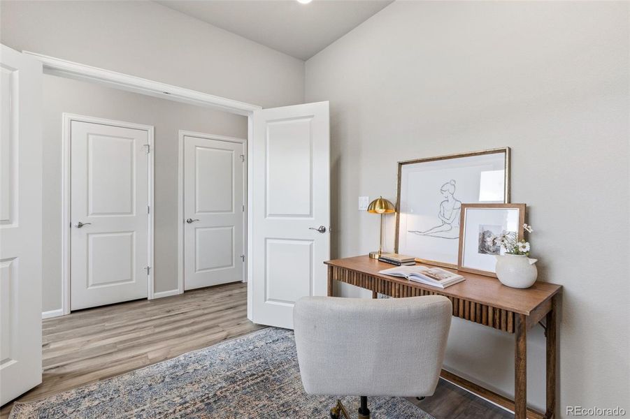 Furnished interior view inside a new home in Woodrose at Painted Prairie, Aurora (Image 11).
