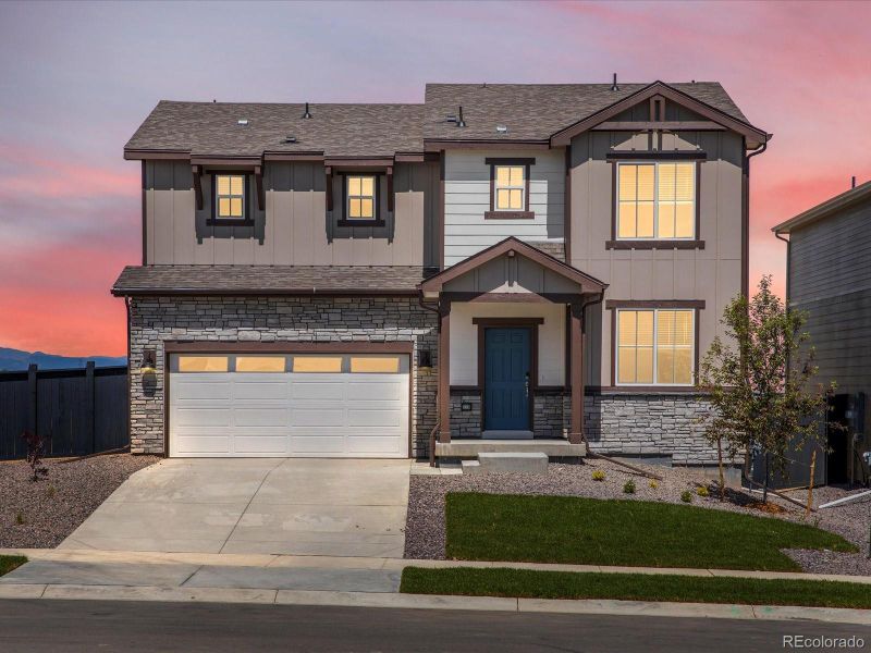 Front exterior of a new home in Westgate, Greeley, CO, highlighting curb appeal (Image 2).