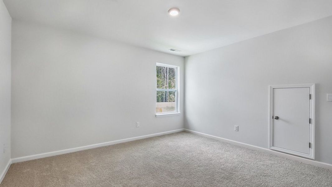 Spacious, unfurnished interior of a new home in The Estates at Edinborough, Gibsonville (Image 32).