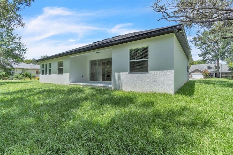 Front exterior of a new home in , Fruitland Park, FL, highlighting curb appeal (Image 17).