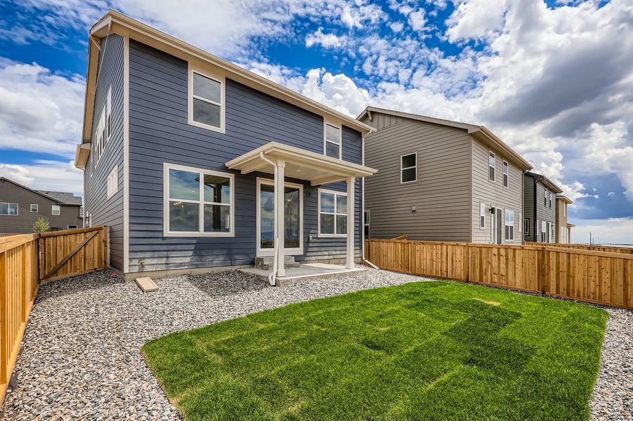Front exterior of a new home in Sterling Ranch 40s, Colorado Springs, CO, highlighting curb appeal (Image 20). Front exterior of a new home in Sterling Ranch 40s, Colorado Springs, CO, highlighting curb appeal (Image 20).