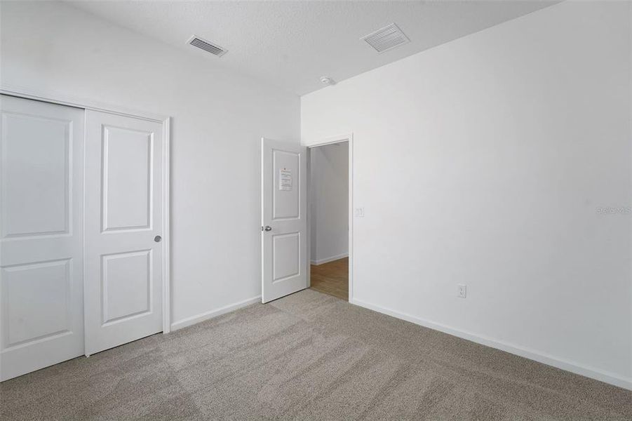 Spacious, unfurnished interior of a new home in Willowbrook North, Winter Haven (Image 33).