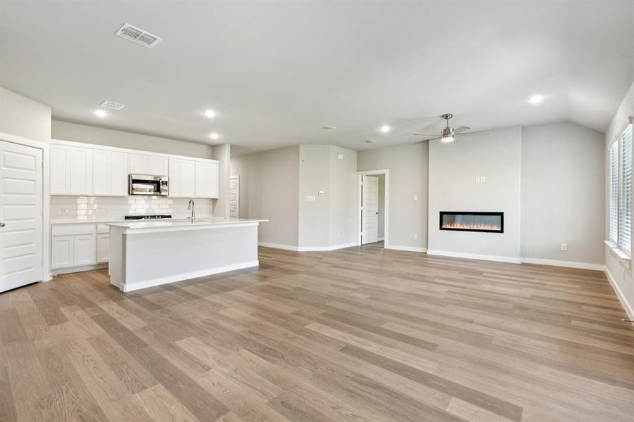 Open Floor Plan in the Emmy II home plan by Trophy Signature Homes - REPRESENTATIVE PHOTO Open Floor Plan in the Emmy II home plan by Trophy Signature Homes - REPRESENTATIVE PHOTO