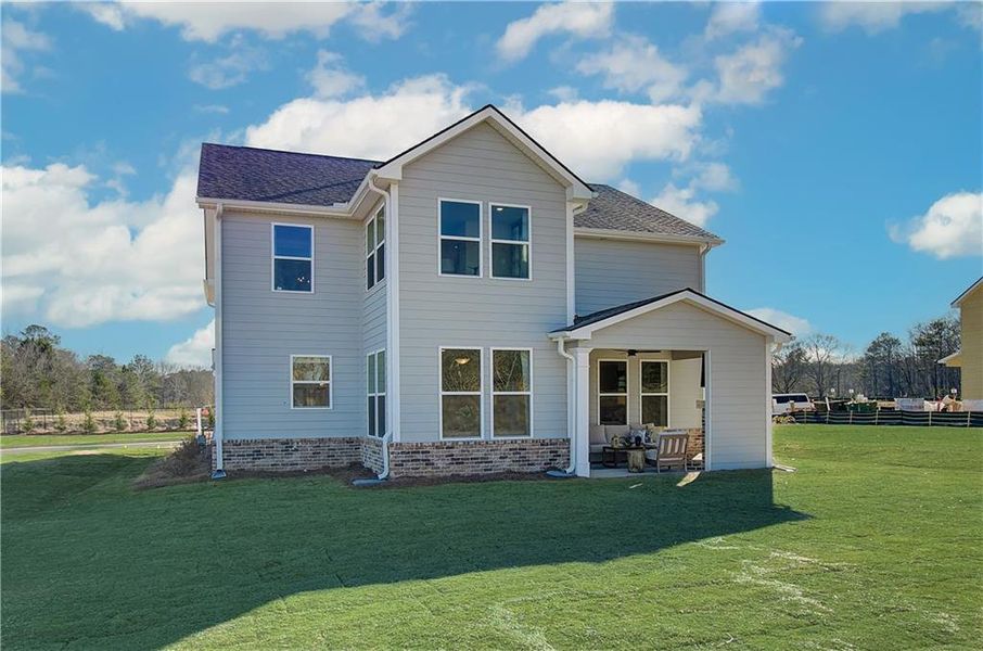 Front exterior of a new home in Cooper Park, McDonough, GA, highlighting curb appeal (Image 22). Front exterior of a new home in Cooper Park, McDonough, GA, highlighting curb appeal (Image 22).