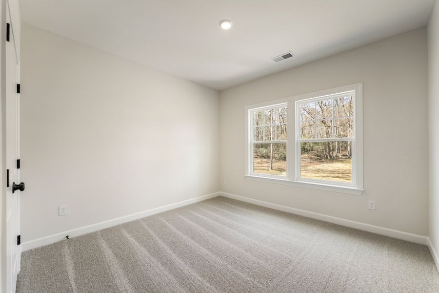 Spacious, unfurnished interior of a new home in Landing at Pine Lake, Anderson (Image 36).