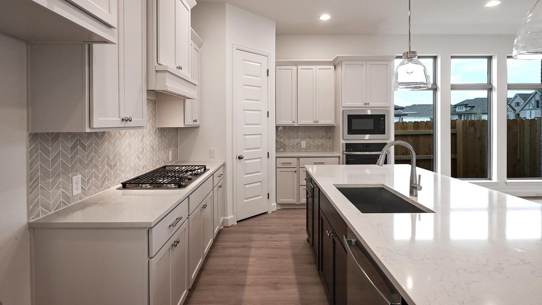 Furnished interior view inside a new home in Crosswinds, Kyle (Image 15).