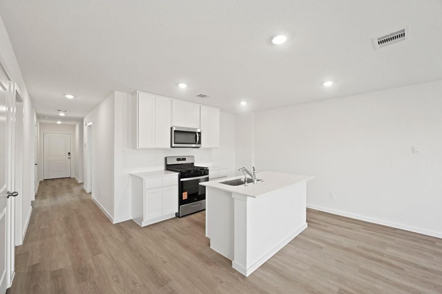 Furnished interior view inside a new home in The Canopies, Splendora (Image 3).
