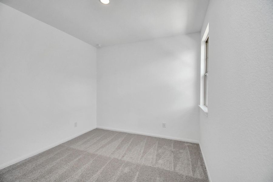 Spacious, unfurnished interior of a new home in 50' Traditional Homes at Elyson, Katy (Image 38).