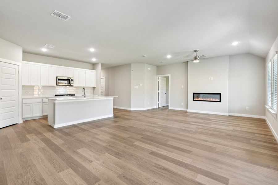 Open Floor Plan in the Emmy II home plan by Trophy Signature Homes - REPRESENTATIVE PHOTO Open Floor Plan in the Emmy II home plan by Trophy Signature Homes - REPRESENTATIVE PHOTO