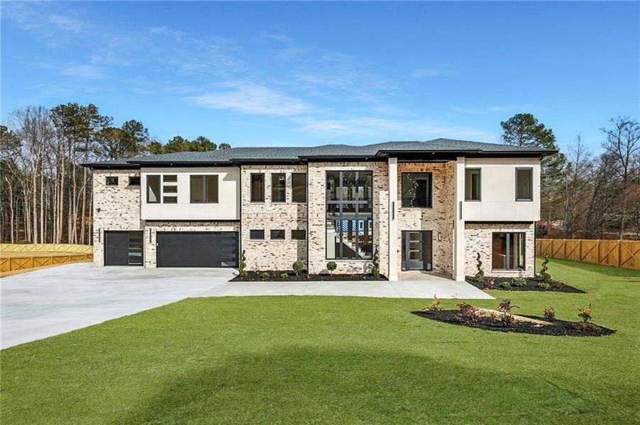 Front exterior of a new home in , Dacula, GA, highlighting curb appeal (Image 1). Front exterior of a new home in , Dacula, GA, highlighting curb appeal (Image 1).