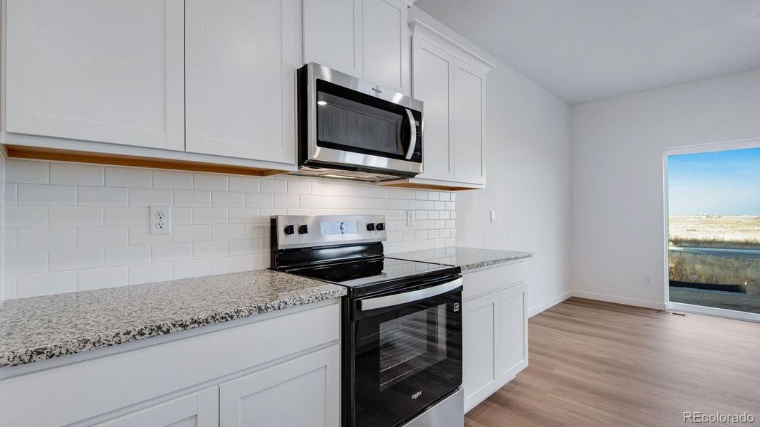 Furnished interior view inside a new home in Spring Valley Ranch, Elizabeth (Image 9).