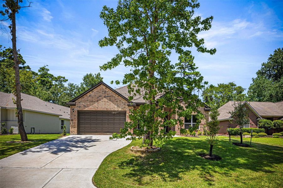 Front exterior of a new home in , Montgomery, TX, highlighting curb appeal (Image 15).