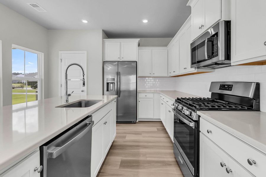 Furnished interior view inside a new home in Horizons at Summers Corner | 55+: The Cottages, Summerville (Image 9). Furnished interior view inside a new home in Horizons at Summers Corner | 55+: The Cottages, Summerville (Image 9).