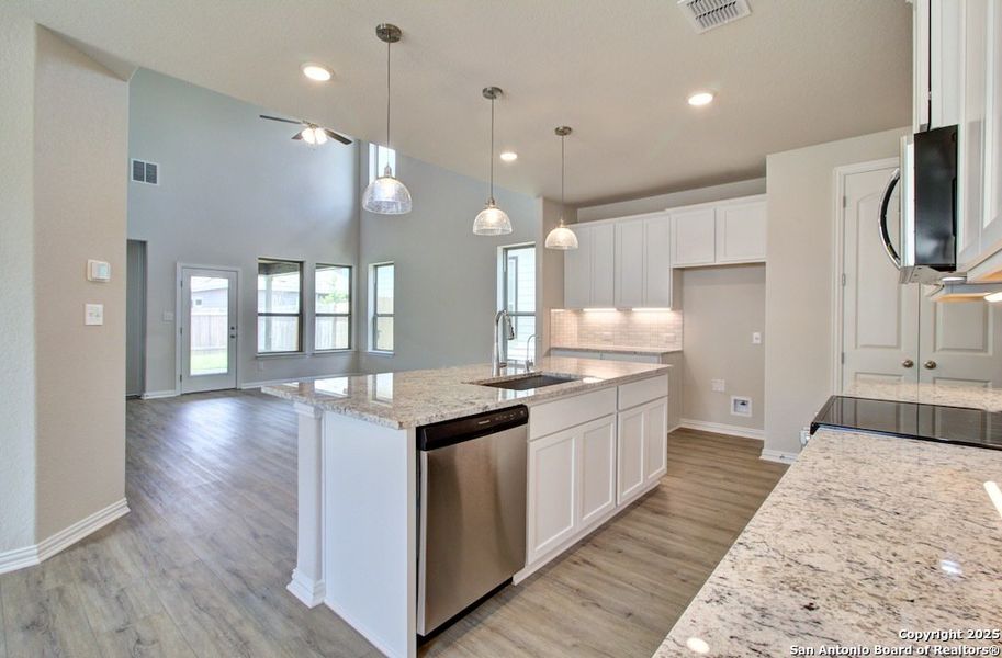 Furnished interior view inside a new home in Casinas at Gruene, New Braunfels (Image 5).