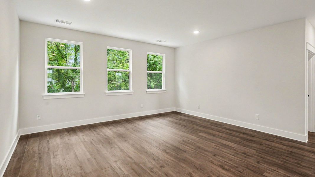Flex space with windows and hard surface flooring Flex space with windows and hard surface flooring