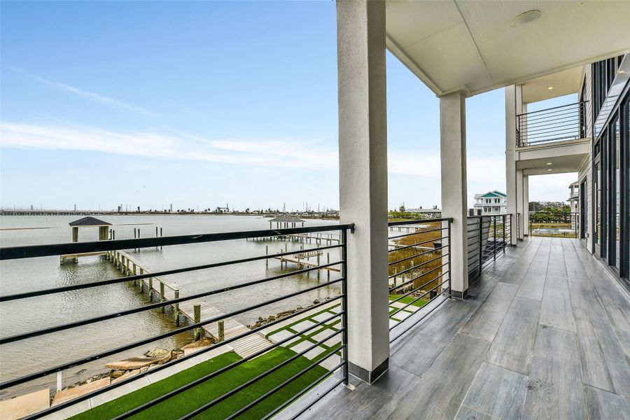 The calm bayou frontage adds privacy and serenity. It’s a setting that feels both exclusive and tranquil.