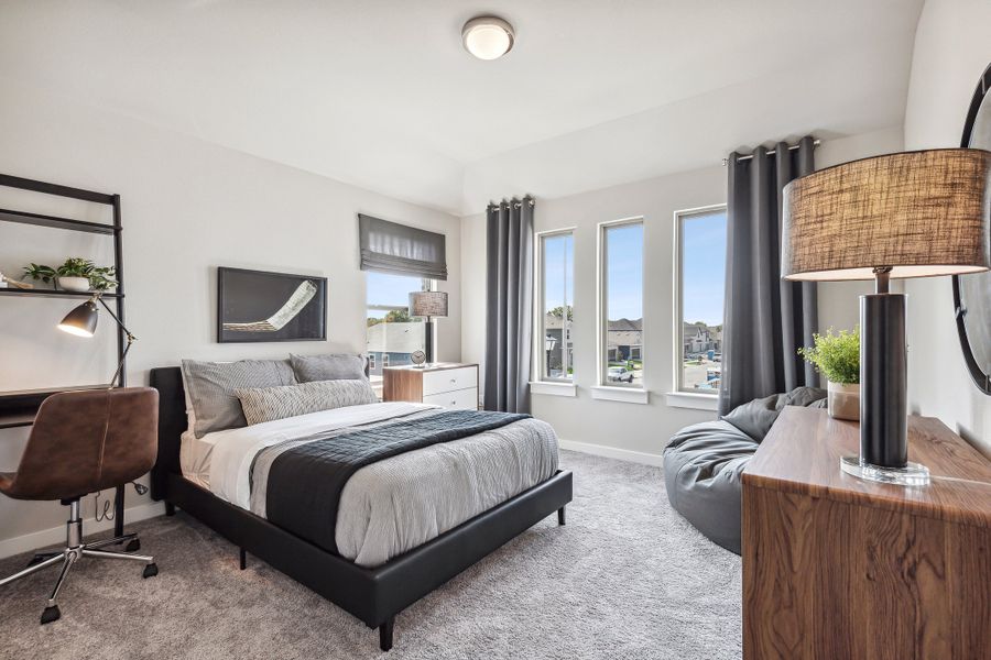 Bedroom in the Wimbledon home plan by Trophy Signature Homes – REPRESENTATIVE PHOTO