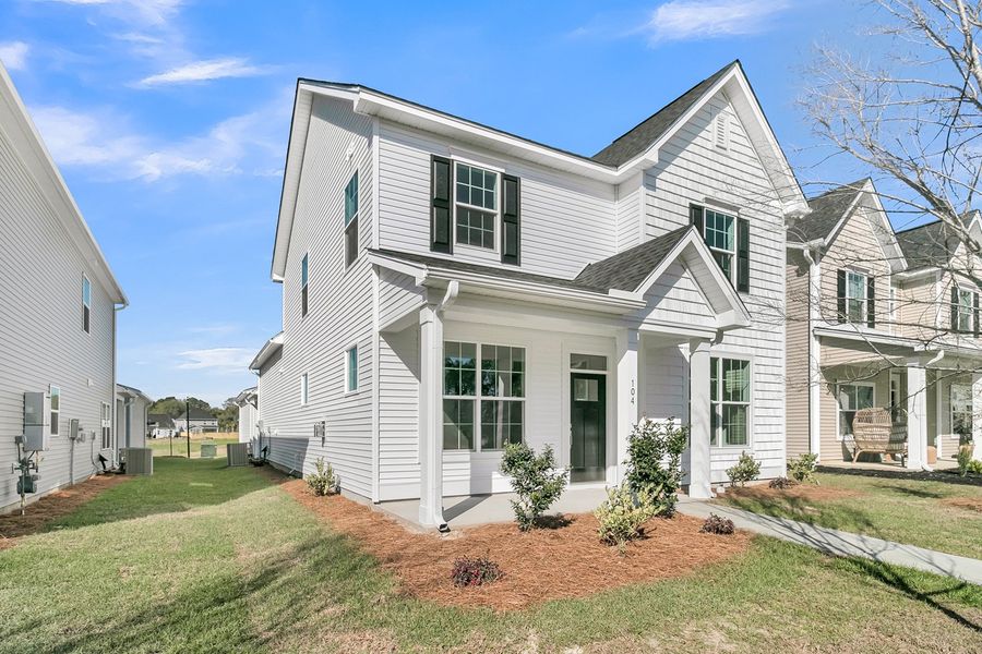 Exterior details and patio area of a home in Six Oaks, Summerville (Image 3).